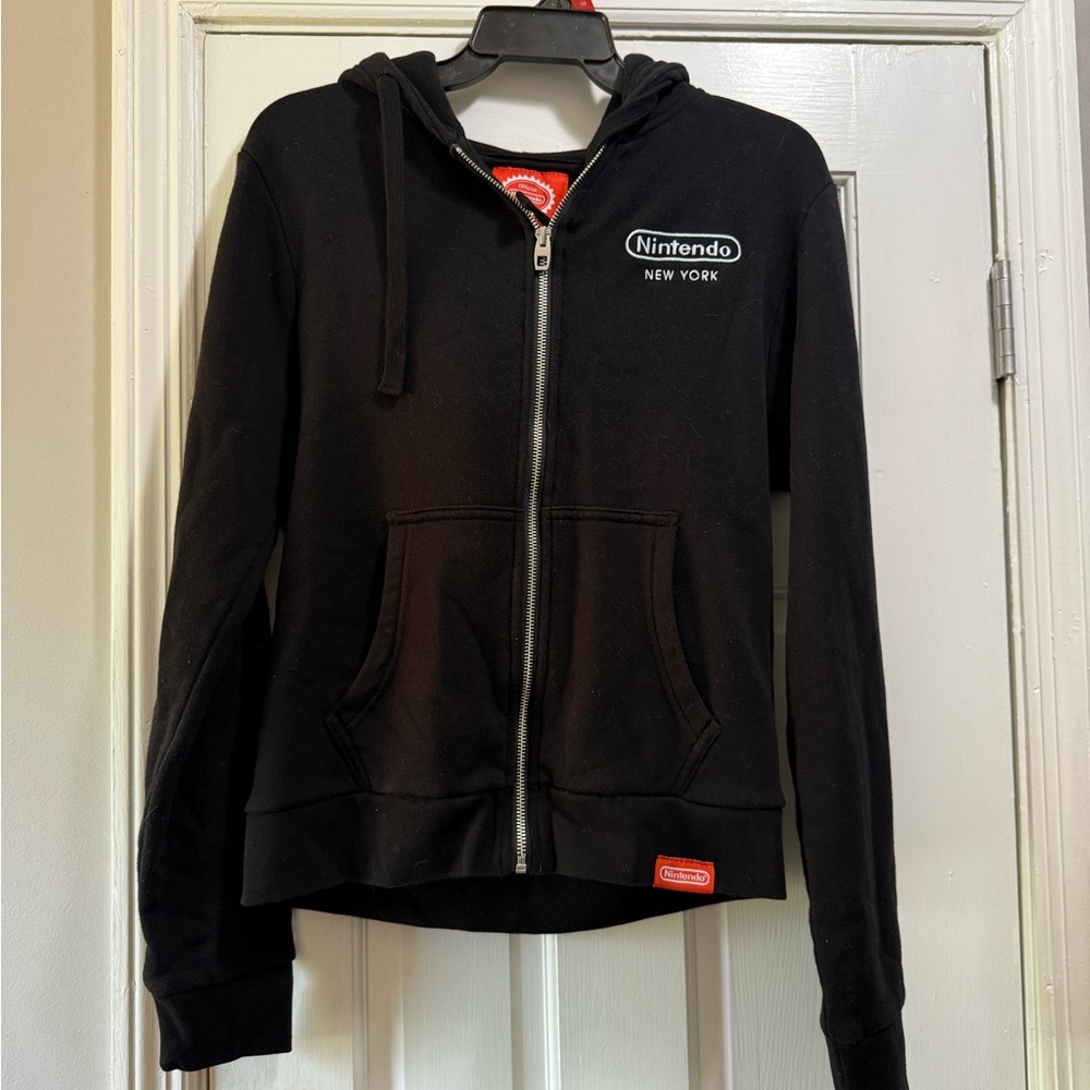 Nintendo Where Everyone Comes to Play Black Zip-Up Hoodie